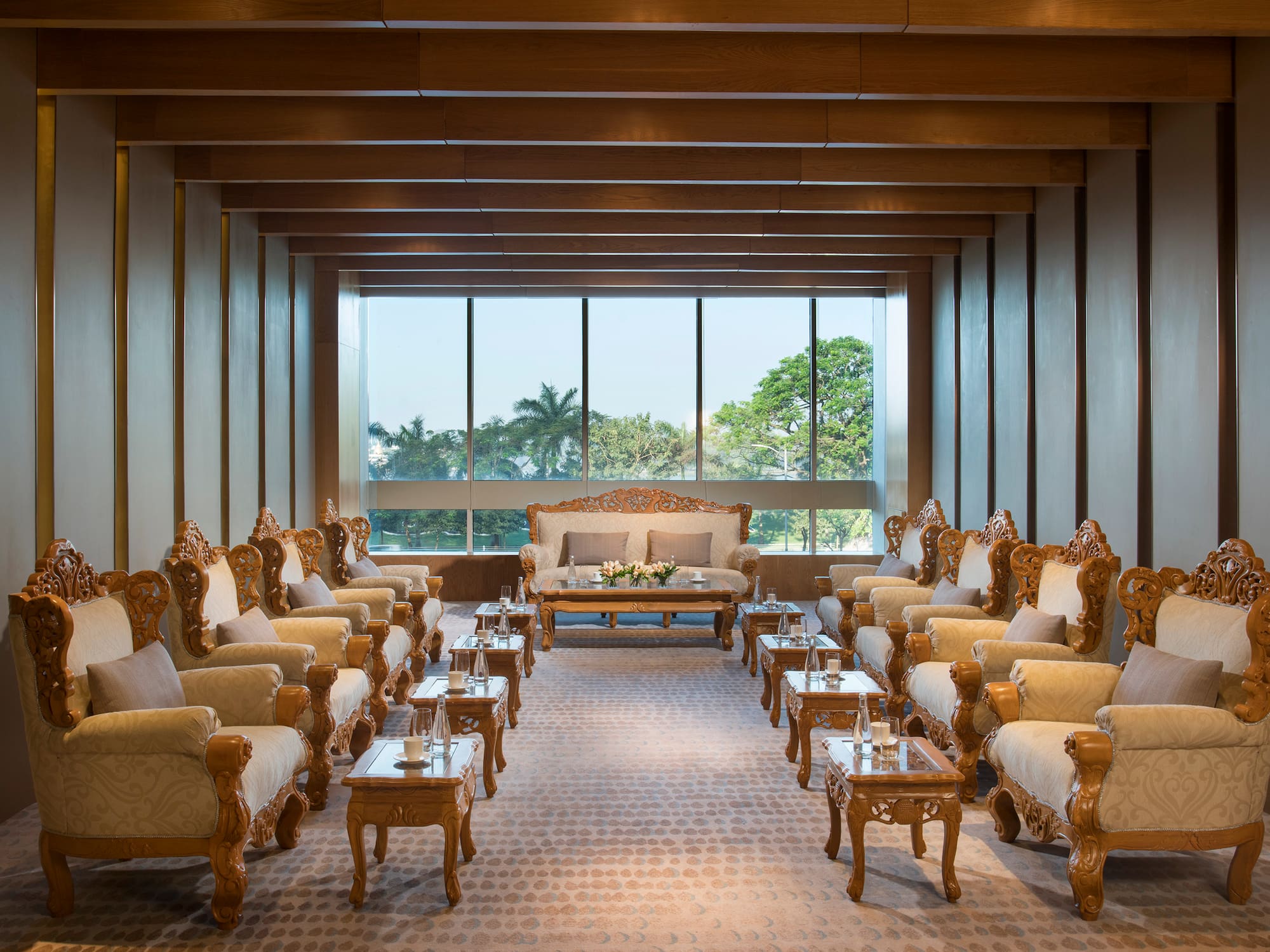 a room with many chairs and tables