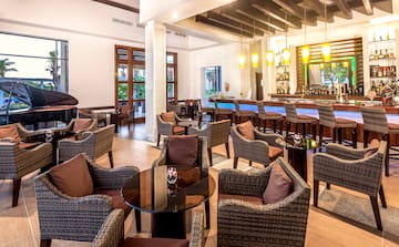 a room with chairs and tables