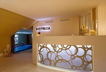 a spa reception area with a pool