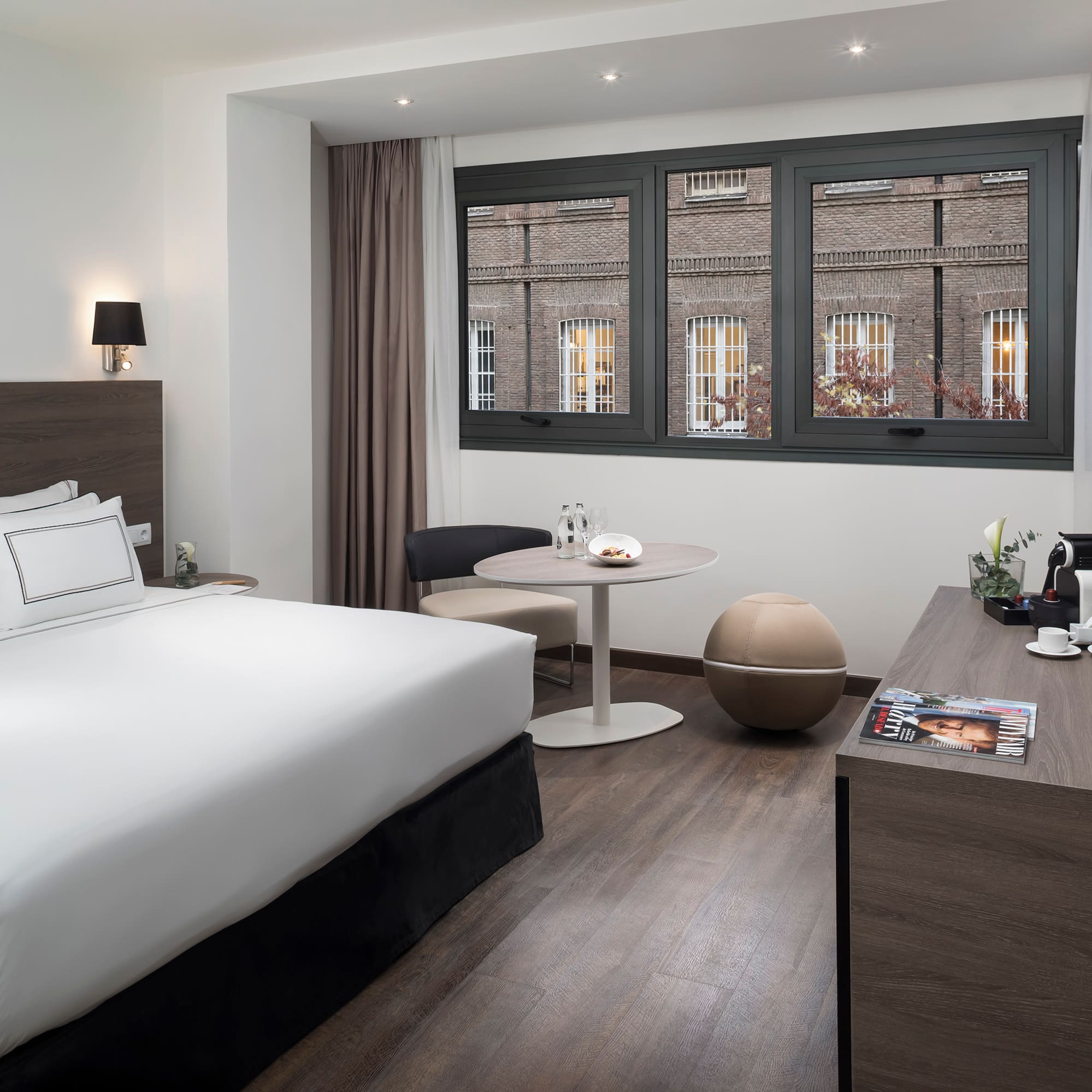 a room with a bed and a table