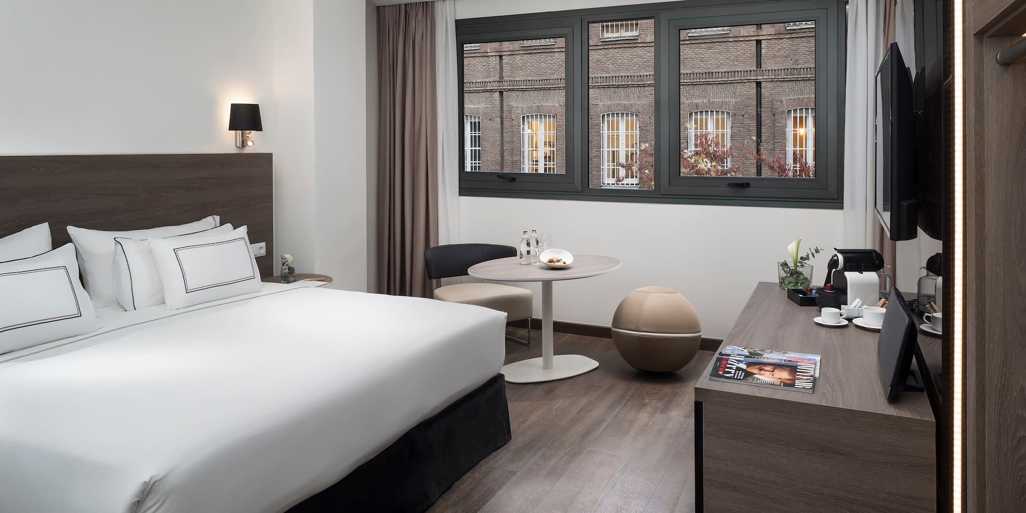 a room with a bed and a table