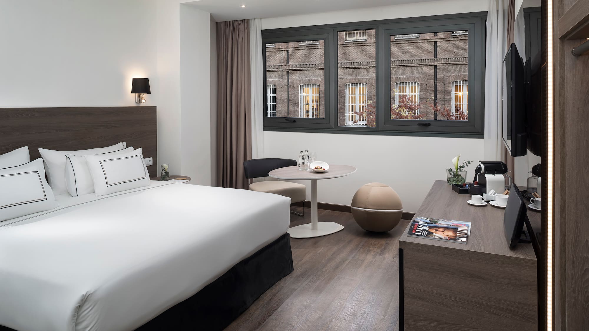 a room with a bed and a table