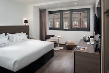a room with a bed and a table