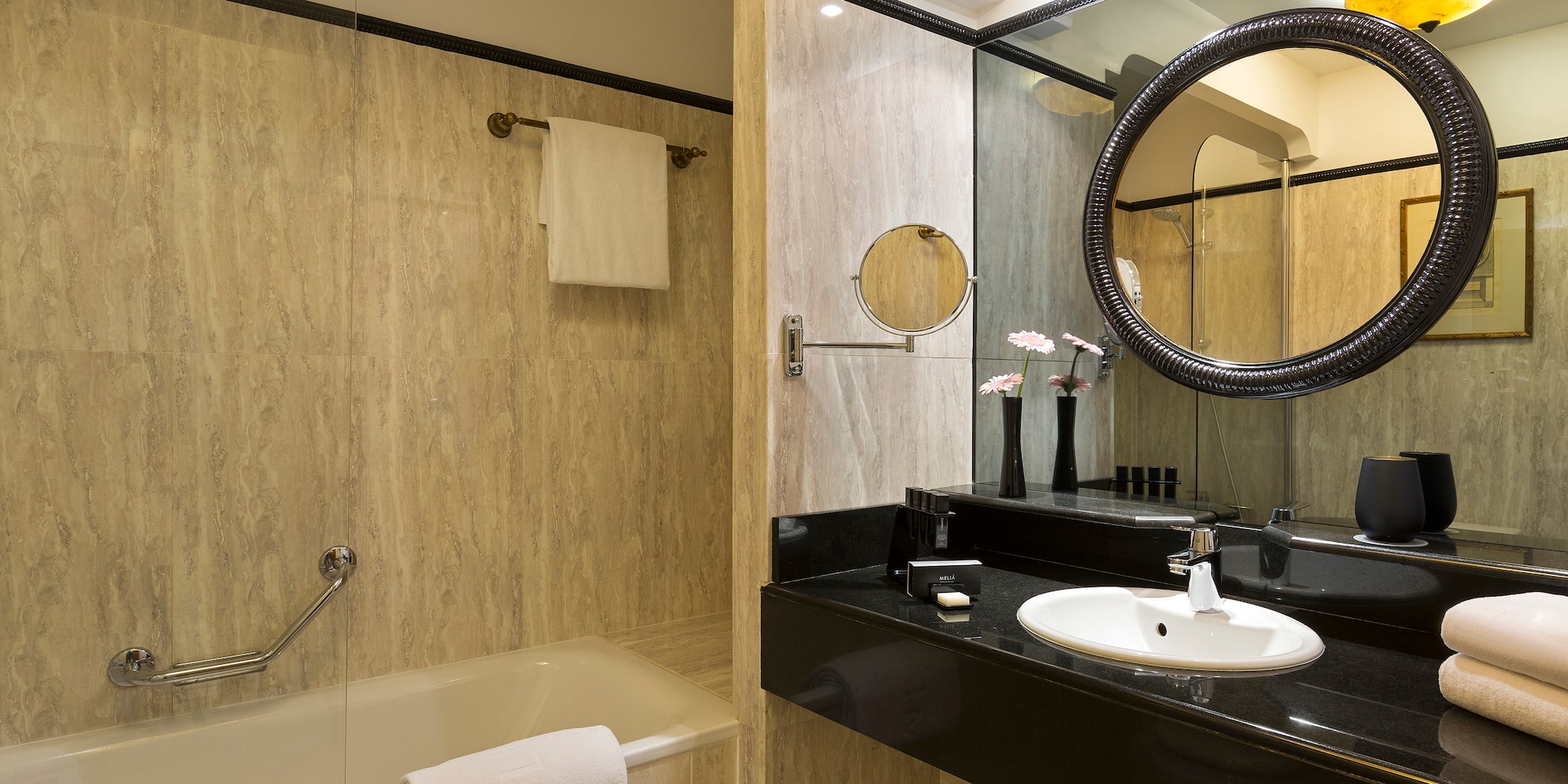 a bathroom with a sink and bathtub