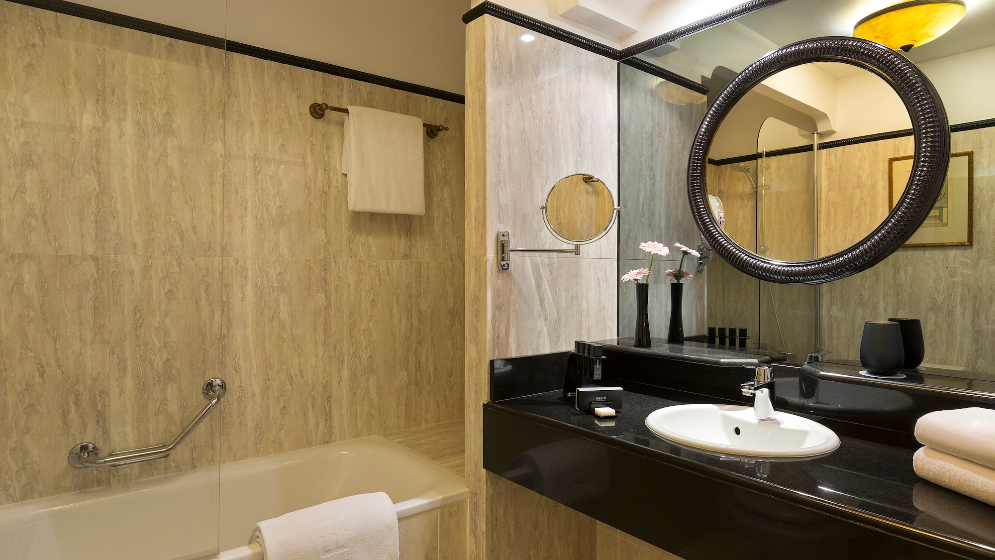a bathroom with a sink and bathtub
