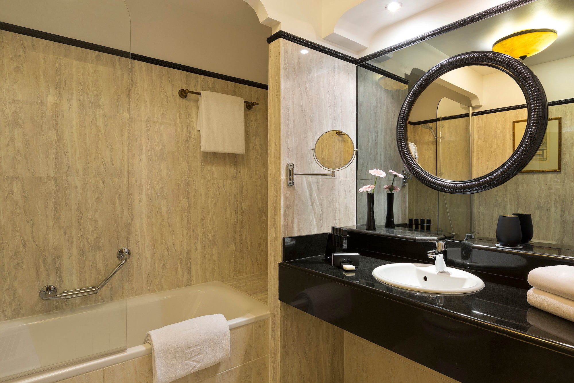 a bathroom with a sink and bathtub