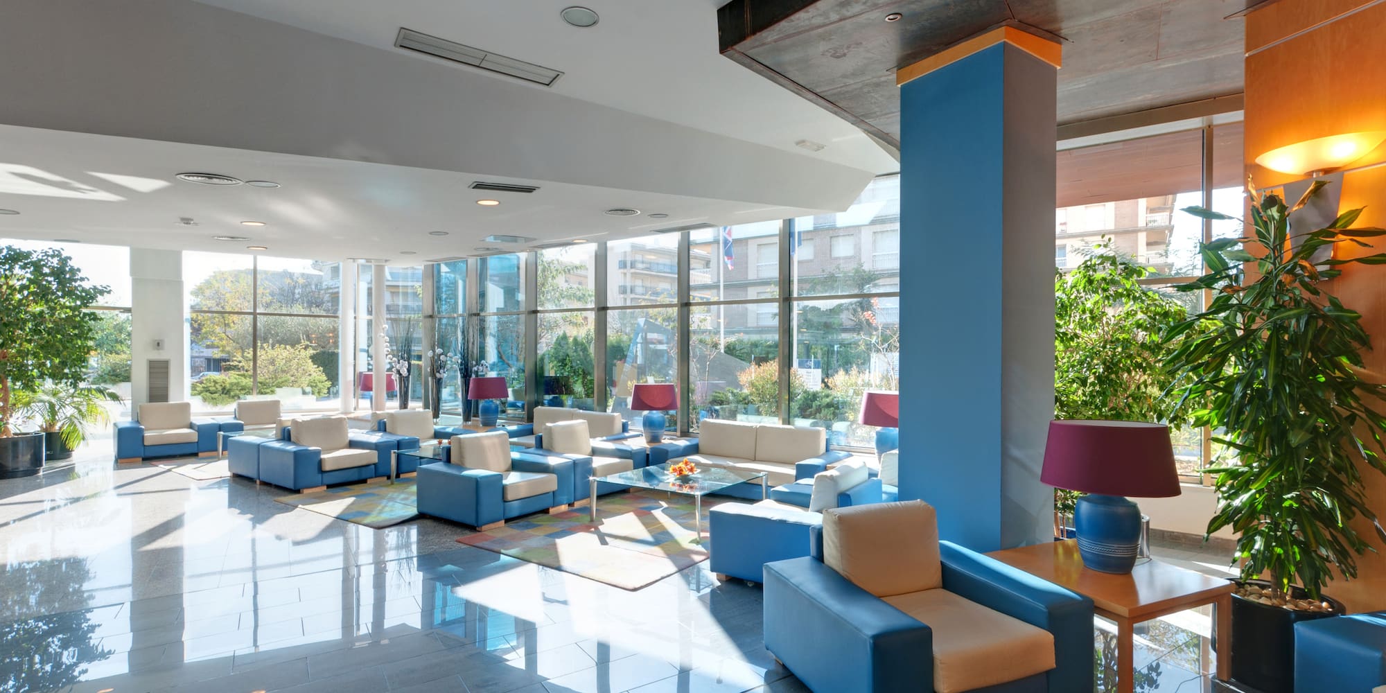 a room with a large window and a large wall