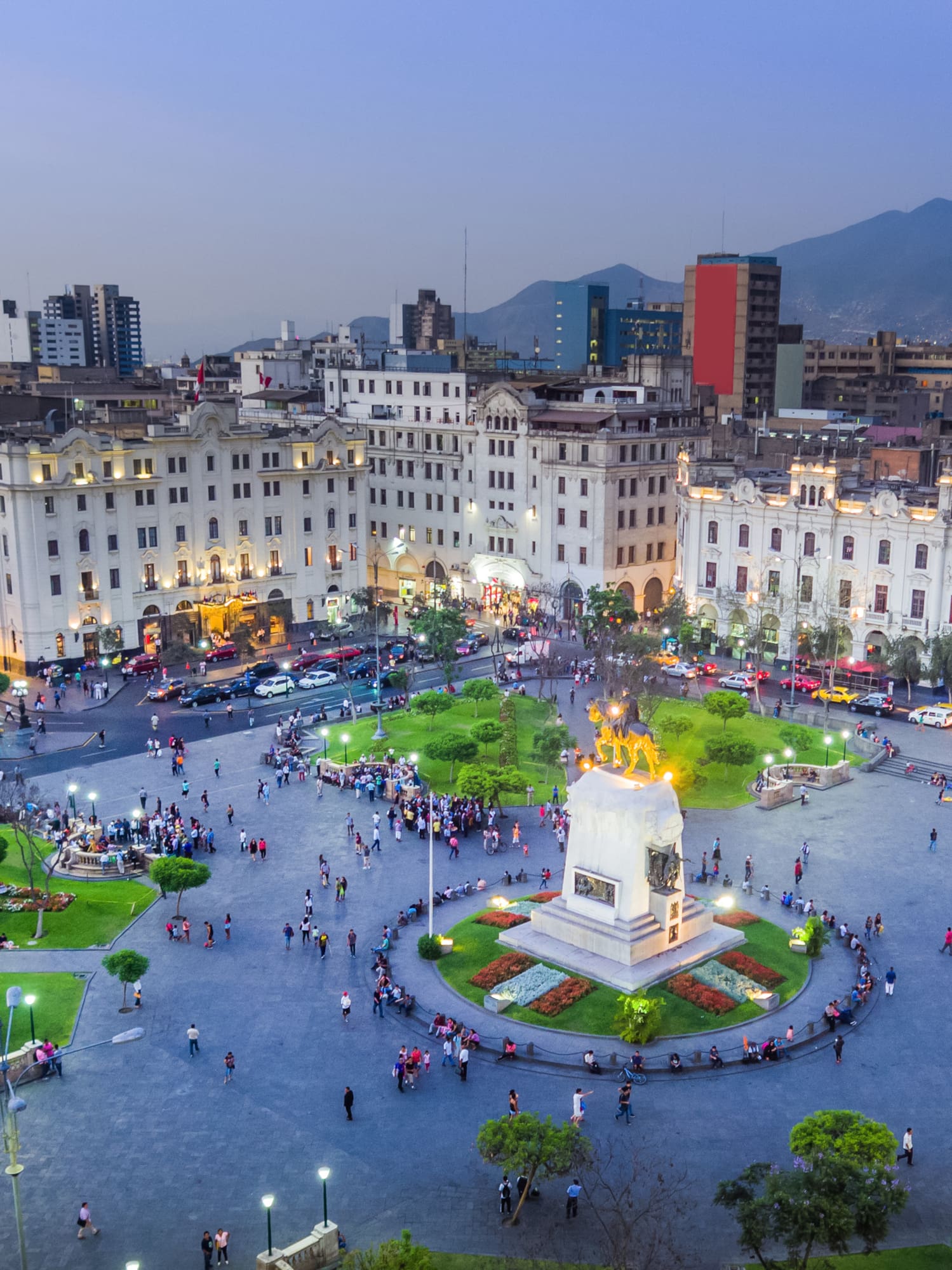 a large city with many buildings and a monument