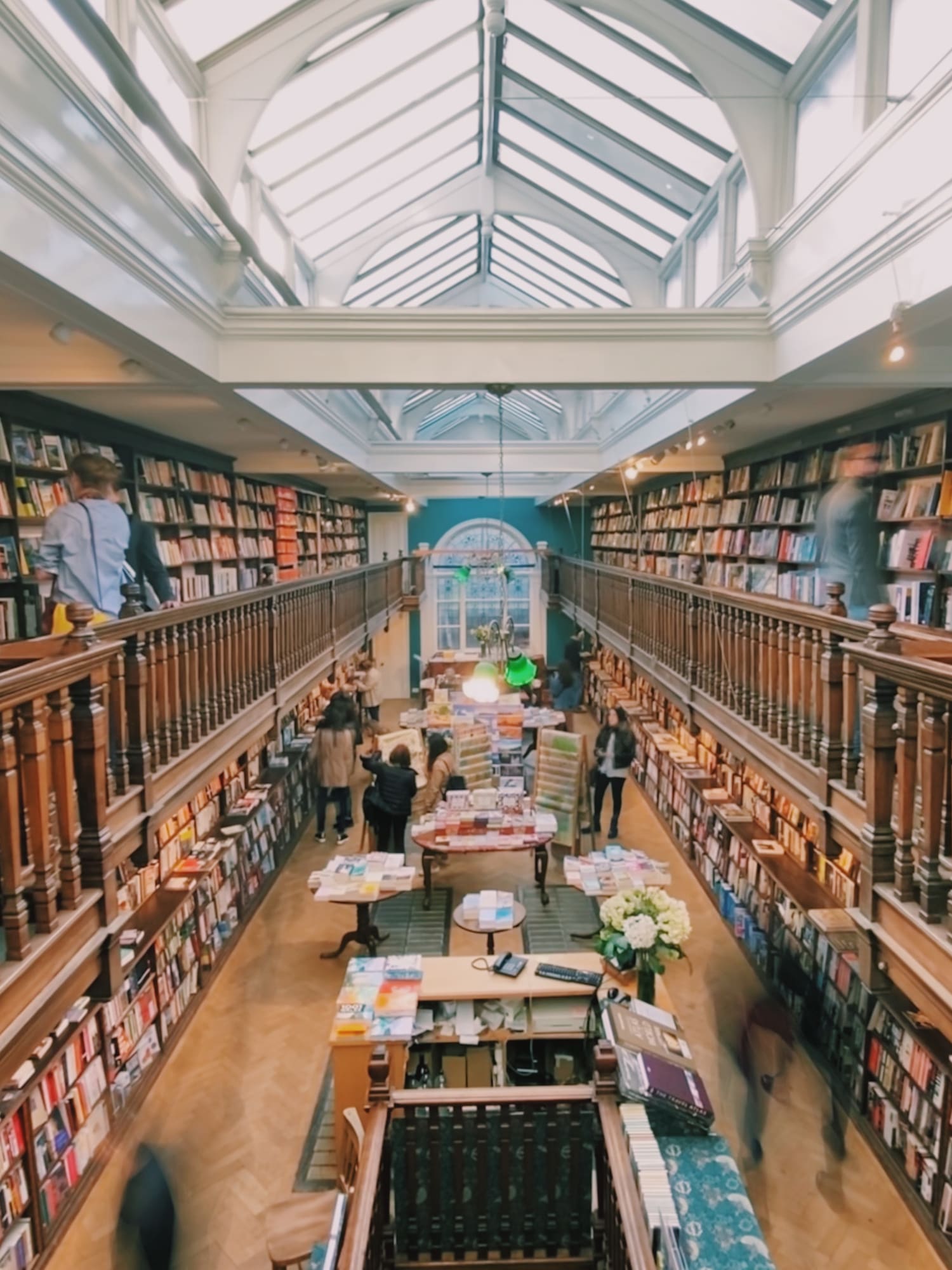 a large room with many books on the shelves