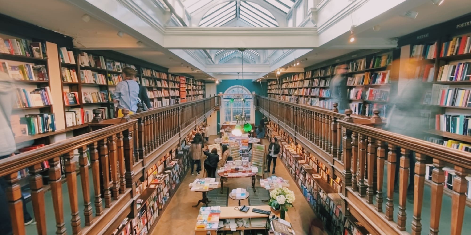 a large room with many books on the shelves