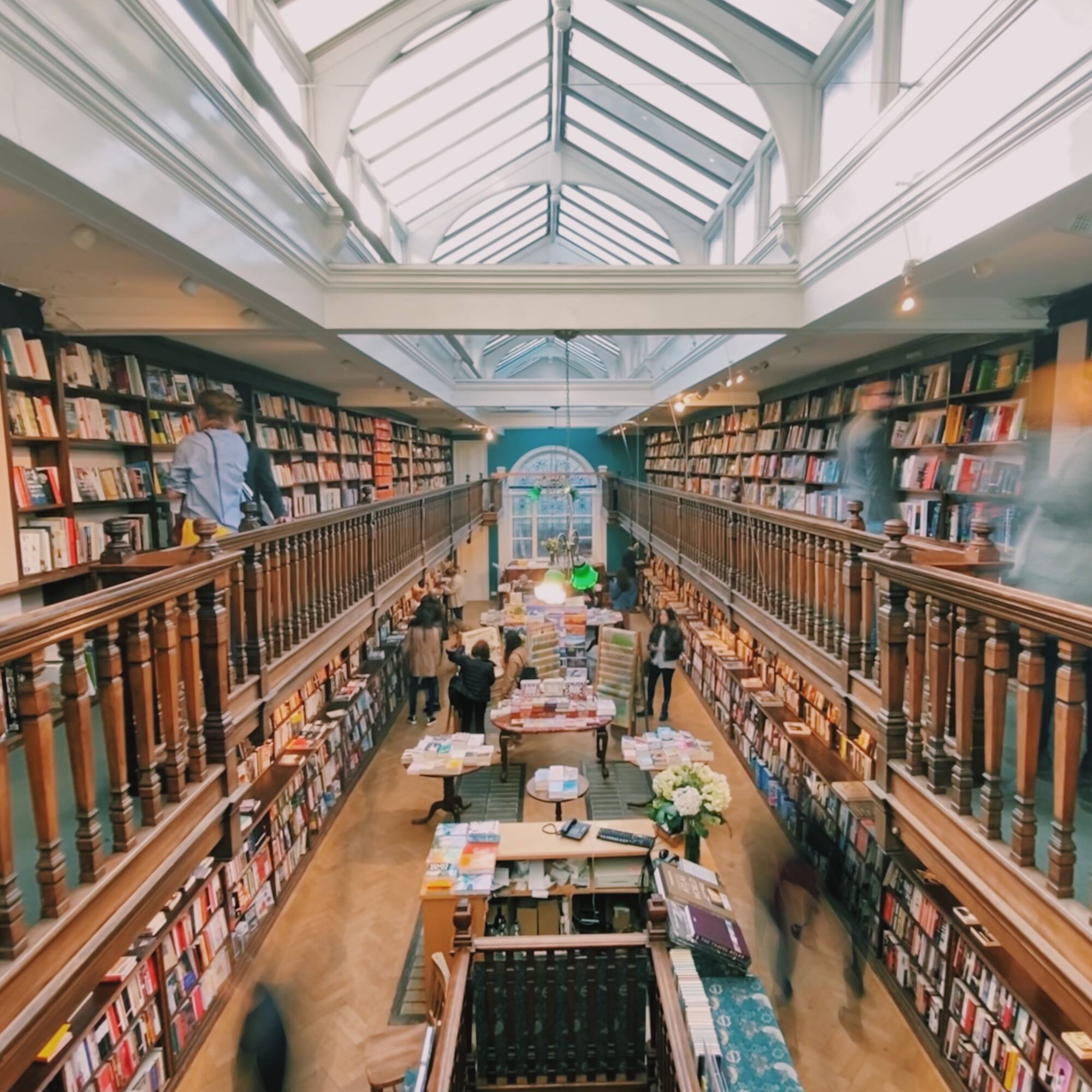 a large room with many books on the shelves