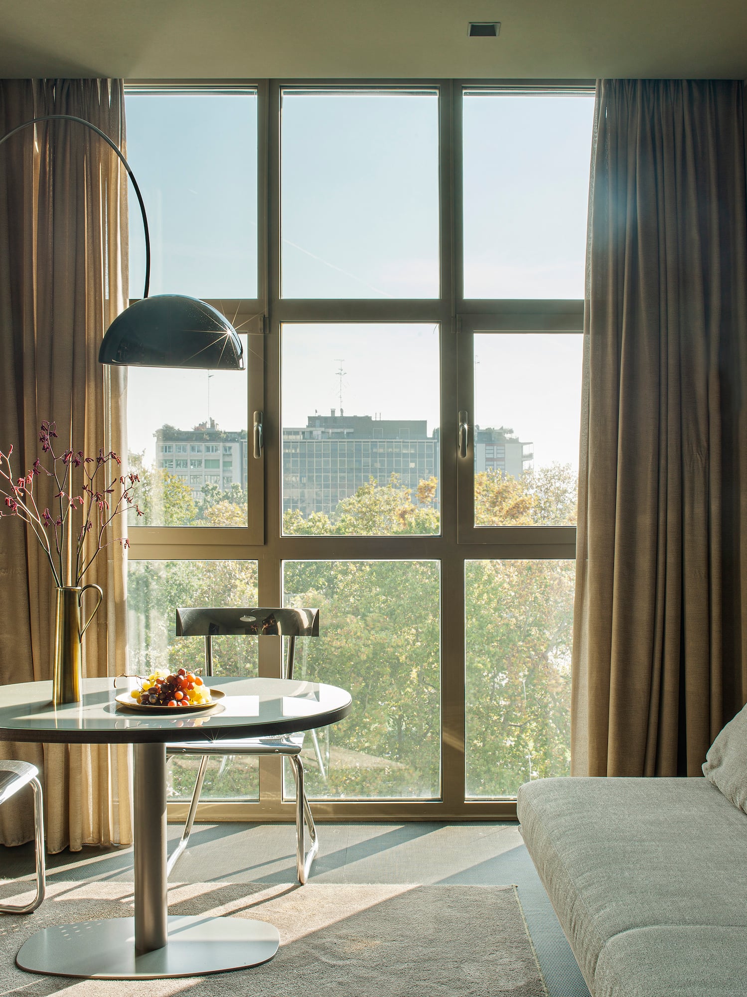 a living room with a couch and a table
