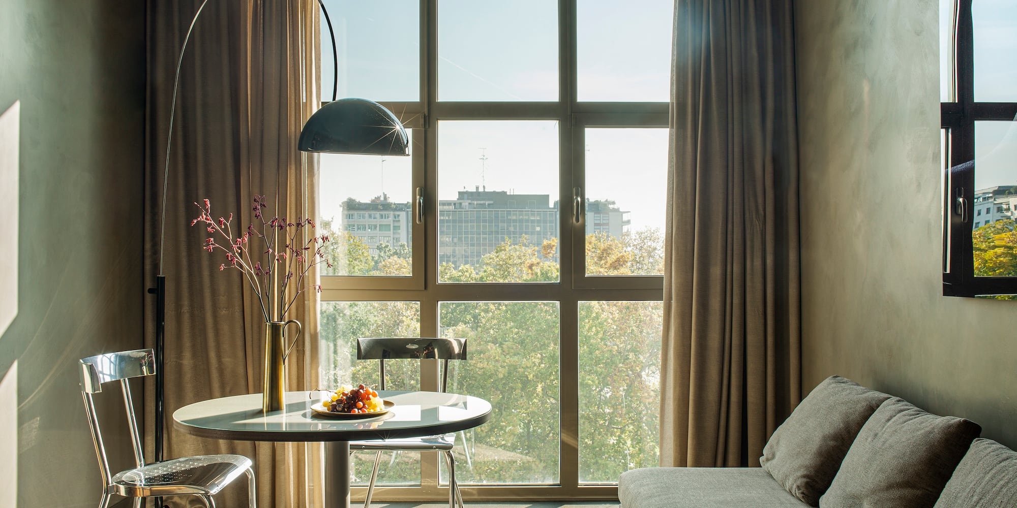 a living room with a couch and a table