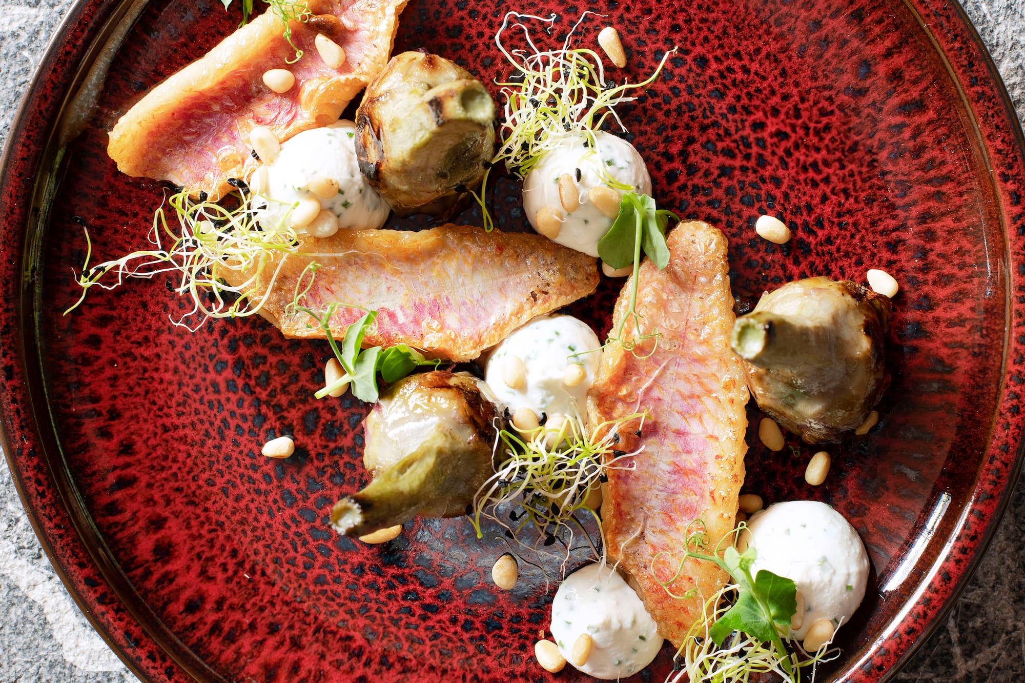 a plate of food on a marbled surface