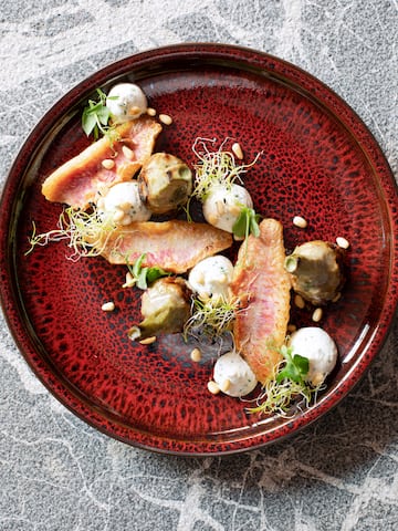 a plate of food on a marbled surface