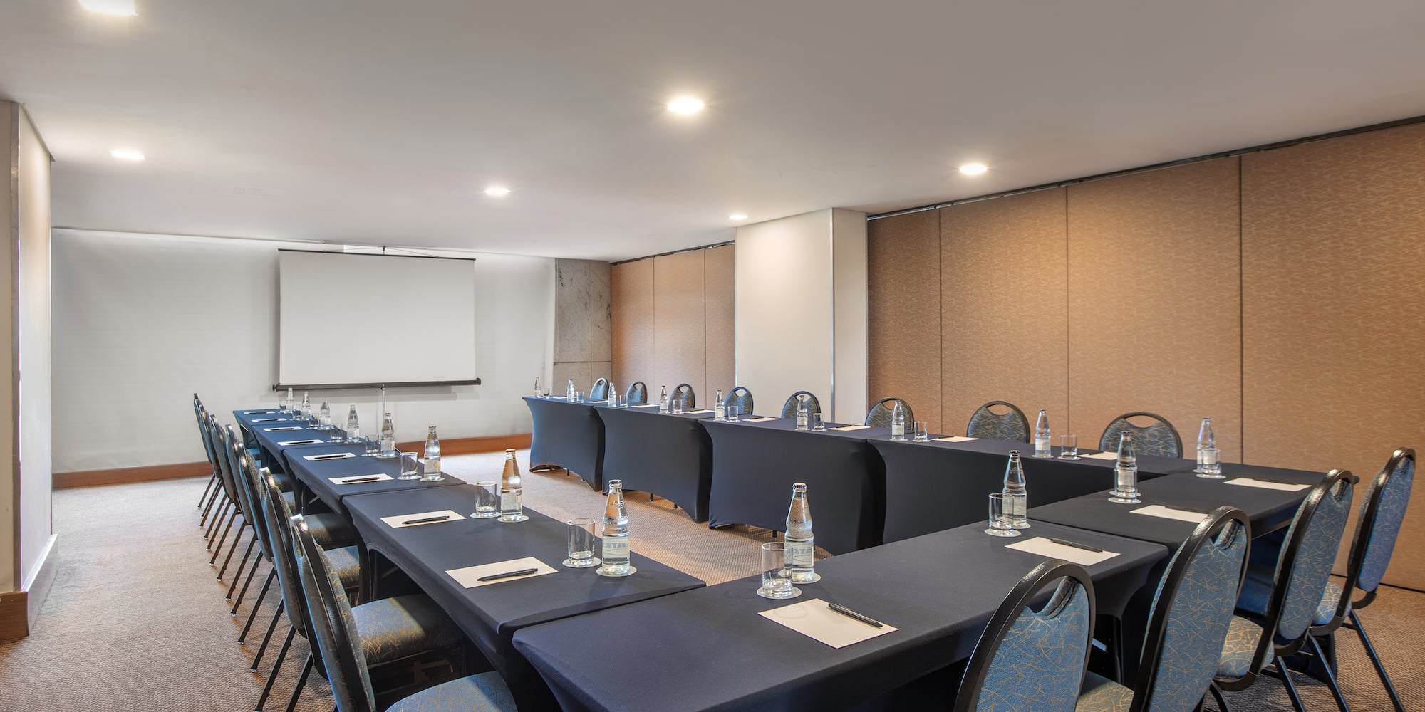 a room with tables and chairs