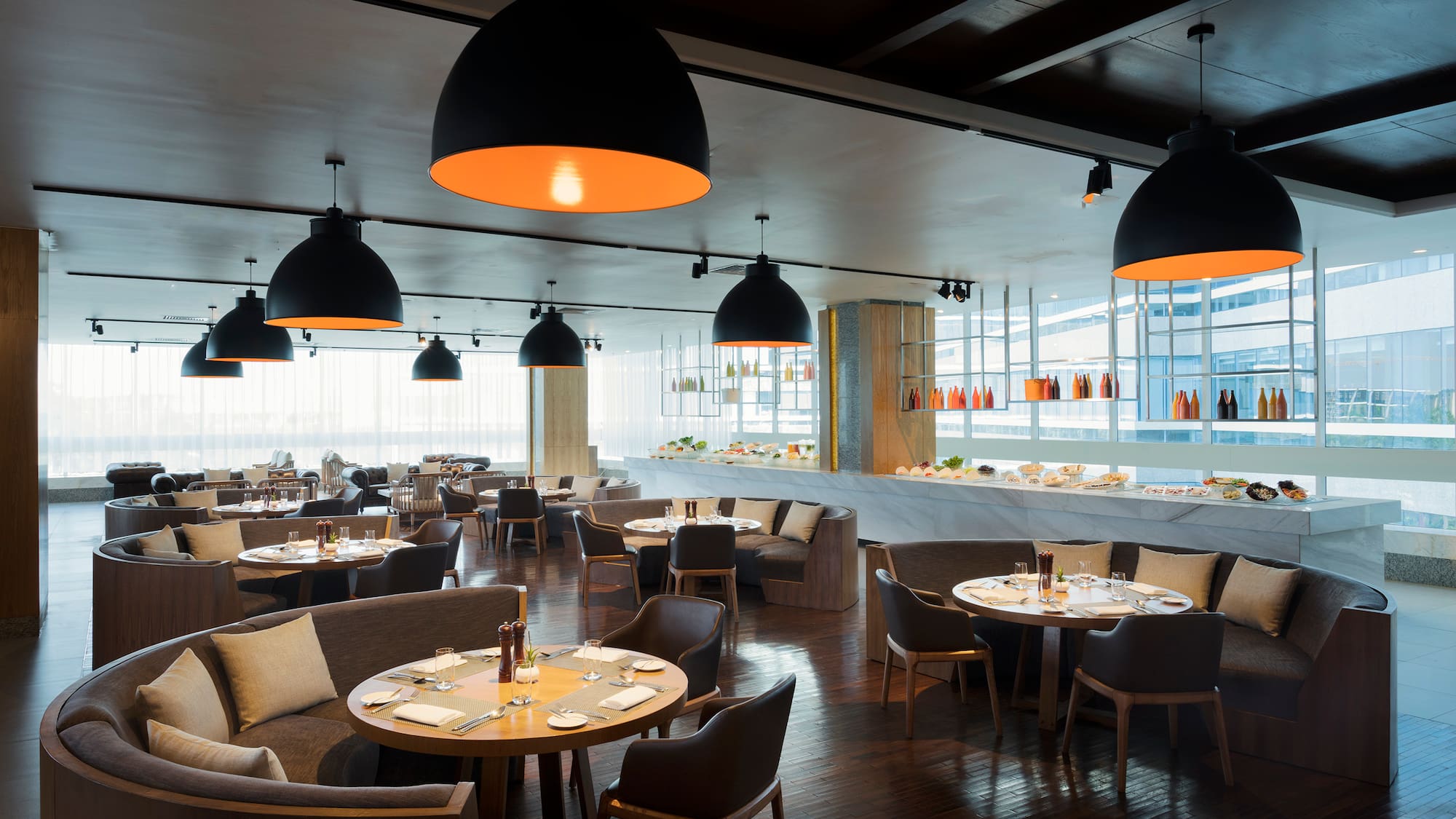 a restaurant with tables and chairs