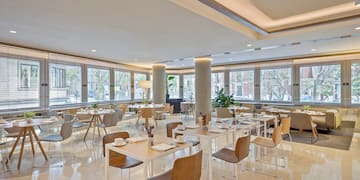 a room with tables and chairs