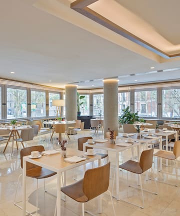 a room with tables and chairs