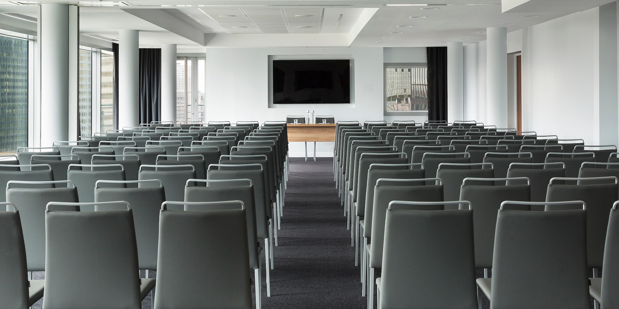 a room with rows of chairs