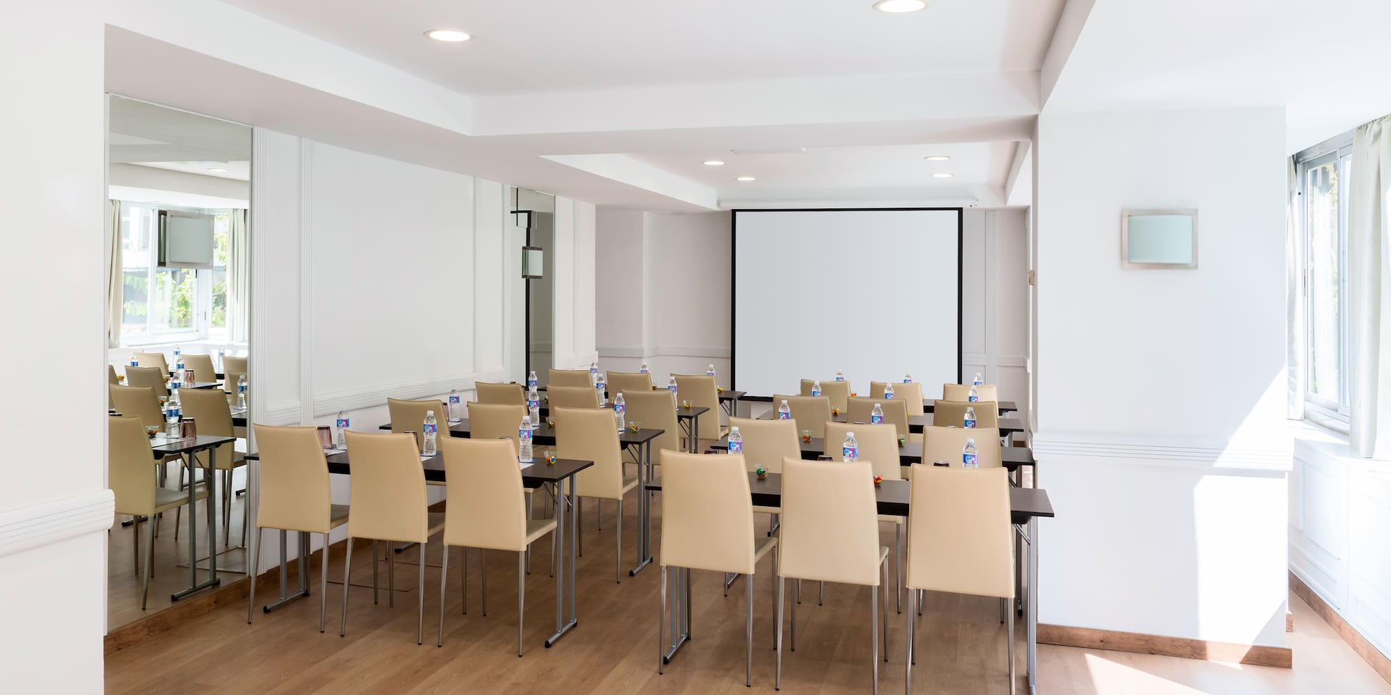 a room with tables and chairs
