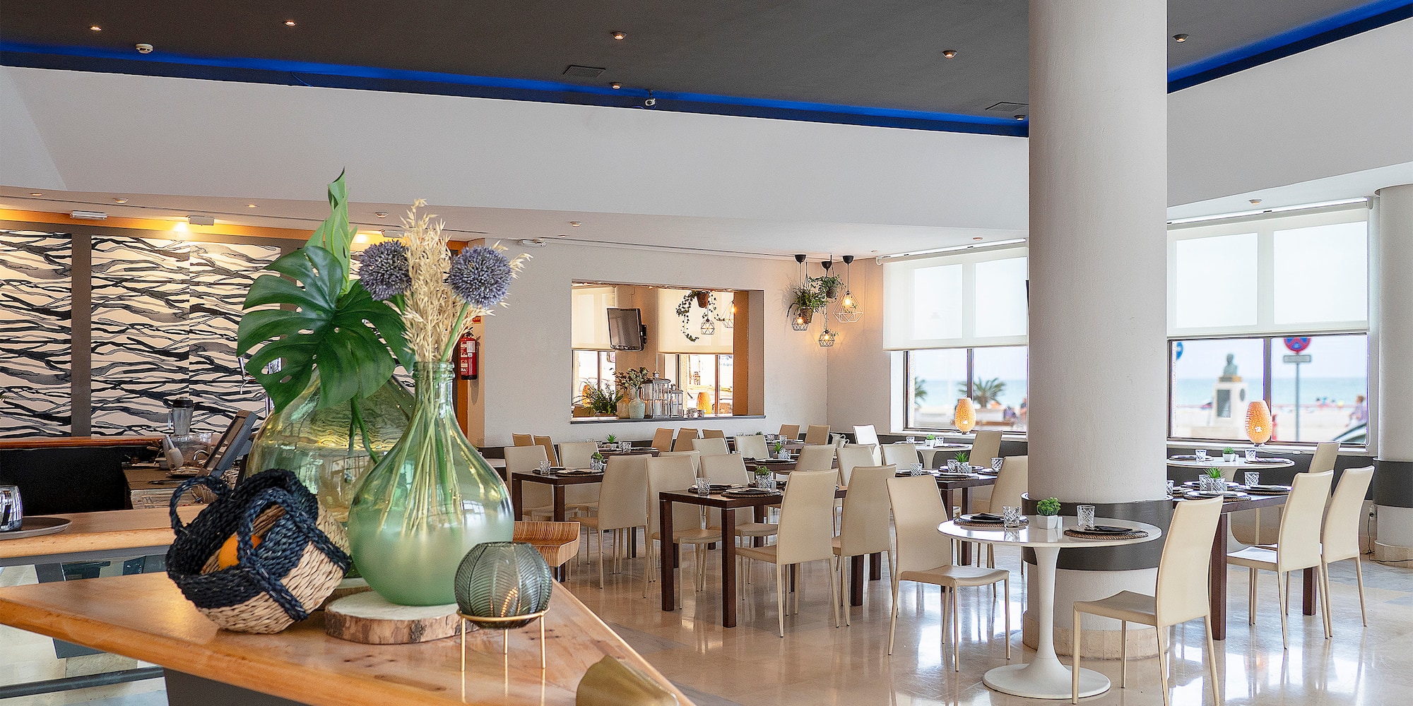 a room with tables and chairs