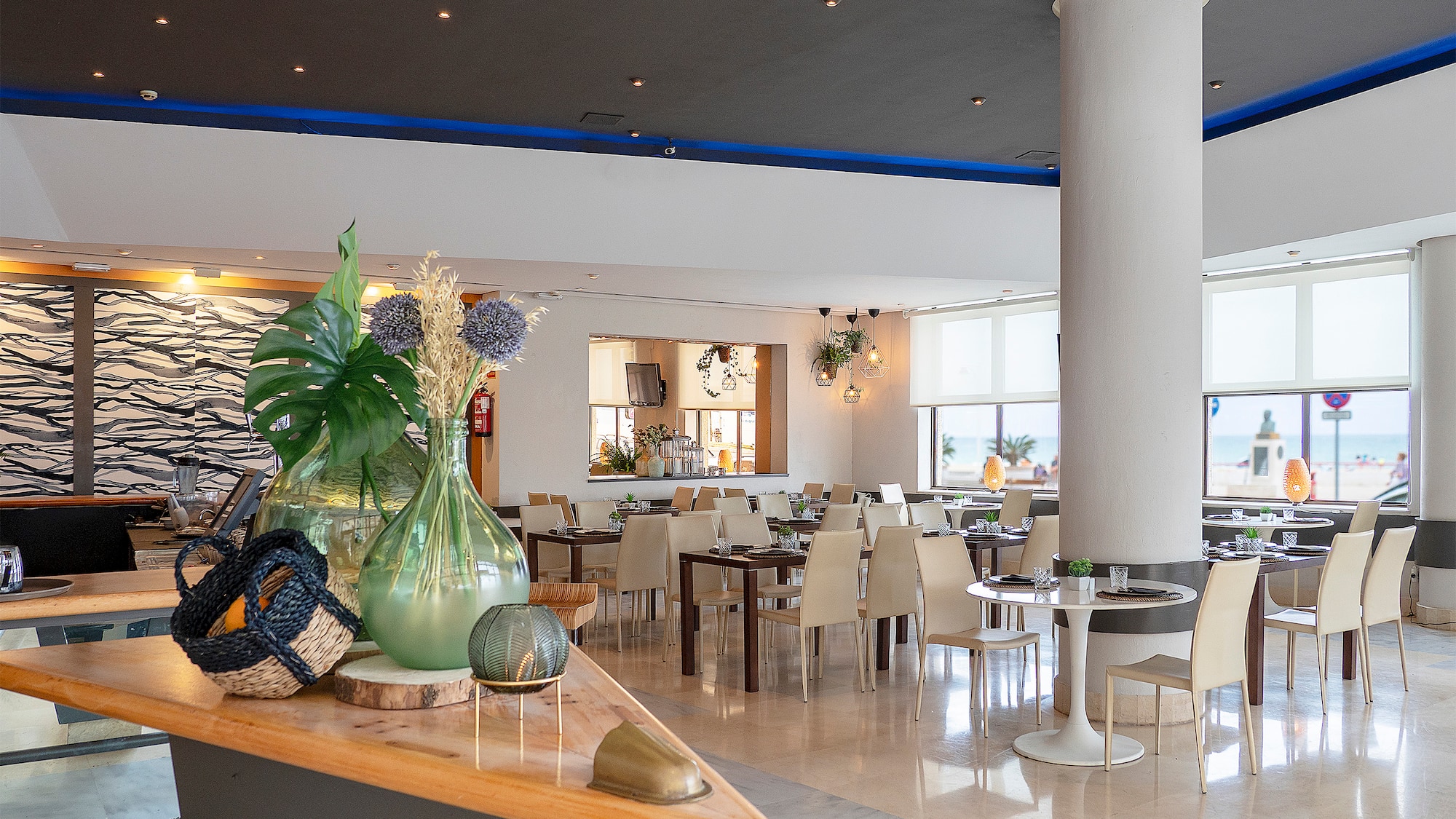 a room with tables and chairs