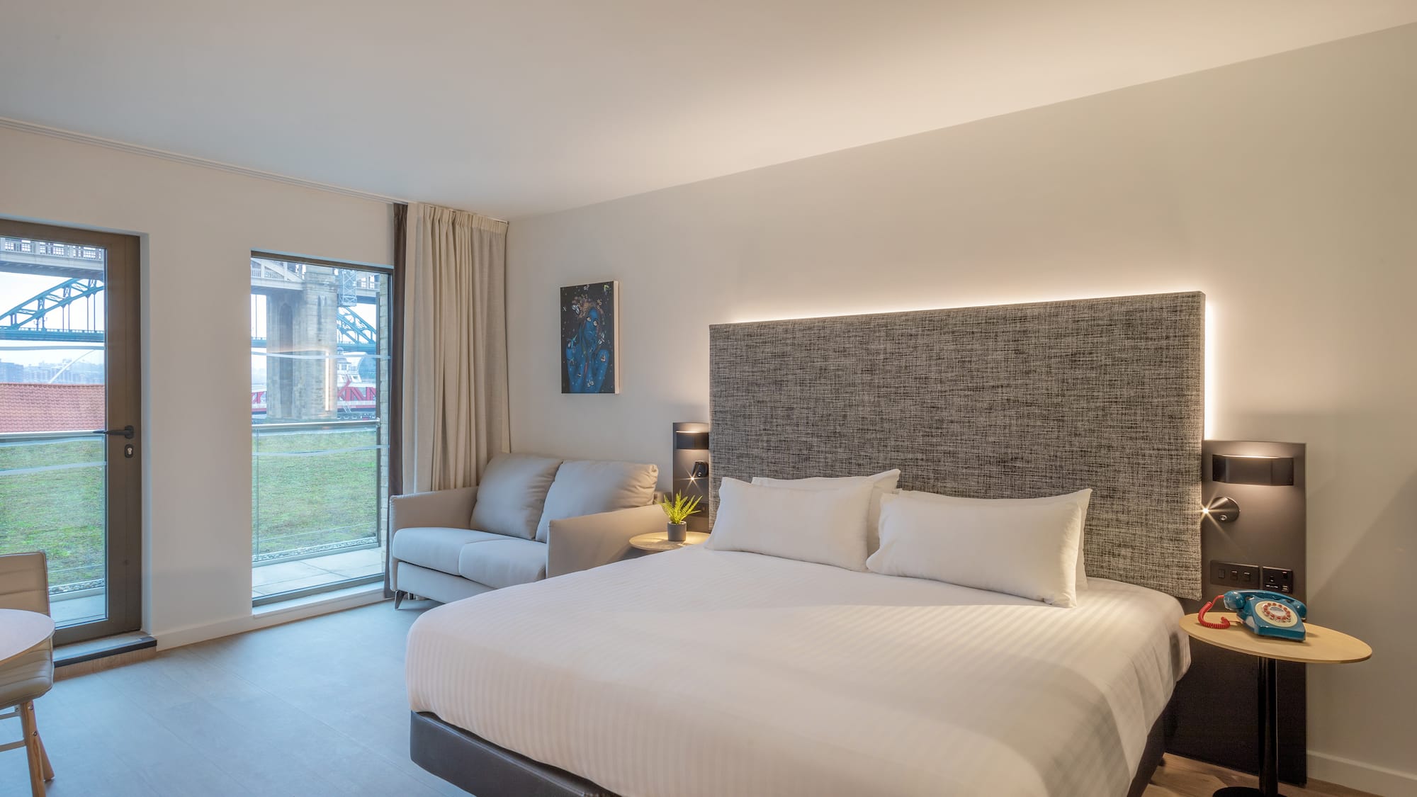 a bed and couch in a room