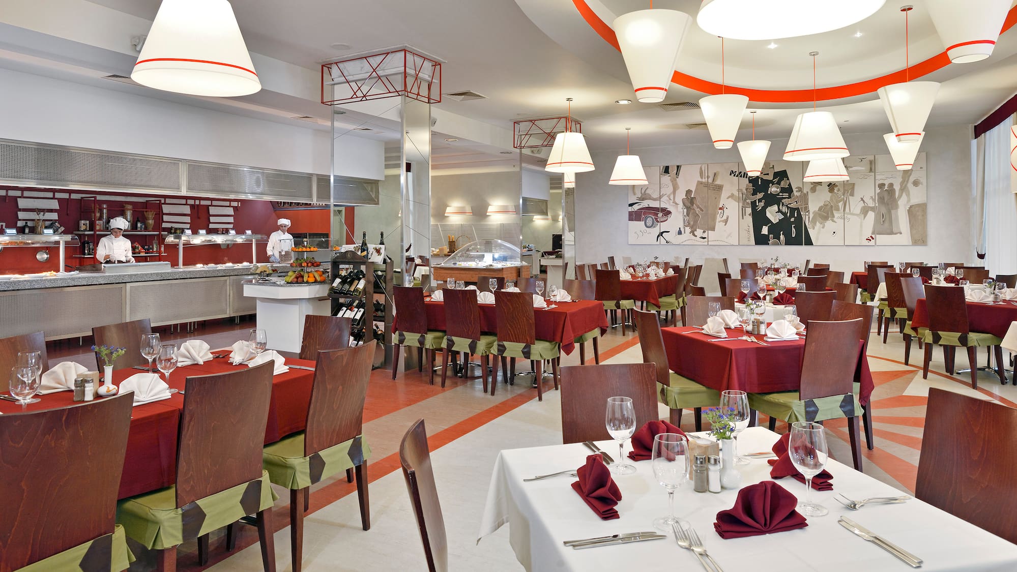 a restaurant with tables and chairs