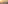 Aerial view of Paris cityscape with Eiffel Tower at golden hour.
