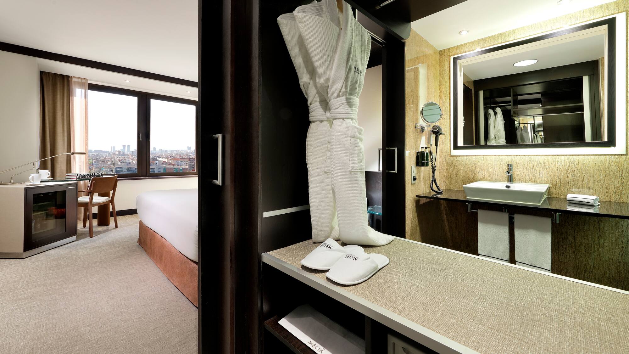 a white robe and slippers in a room