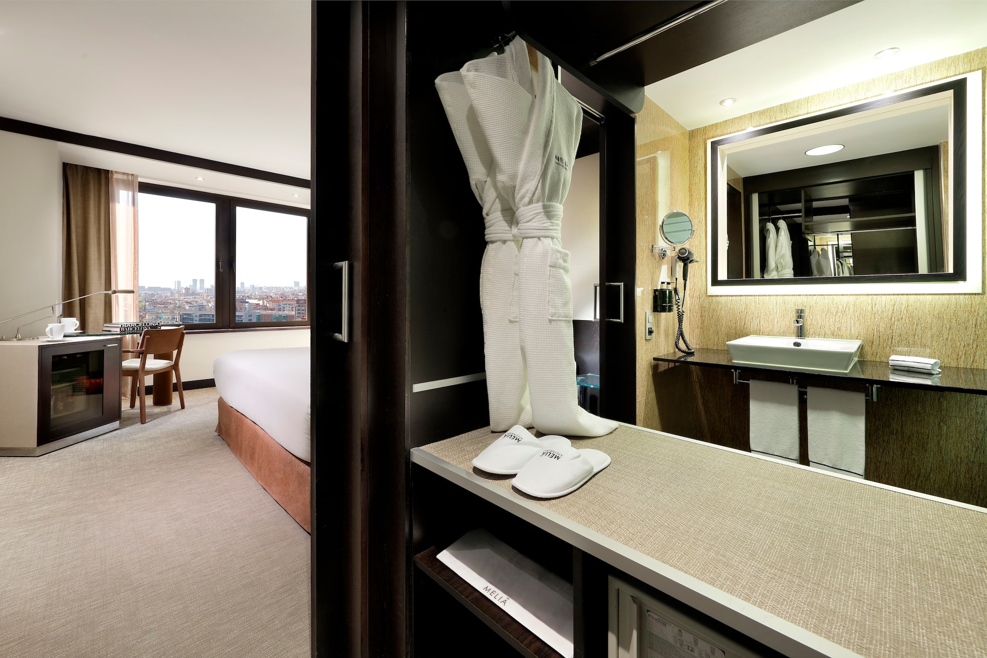 a white robe and slippers in a room