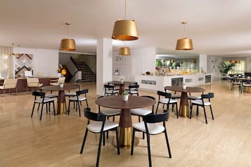 a room with tables and chairs