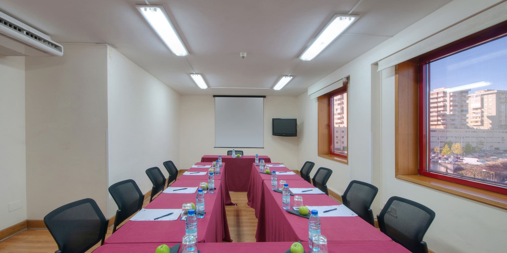 a room with tables and chairs