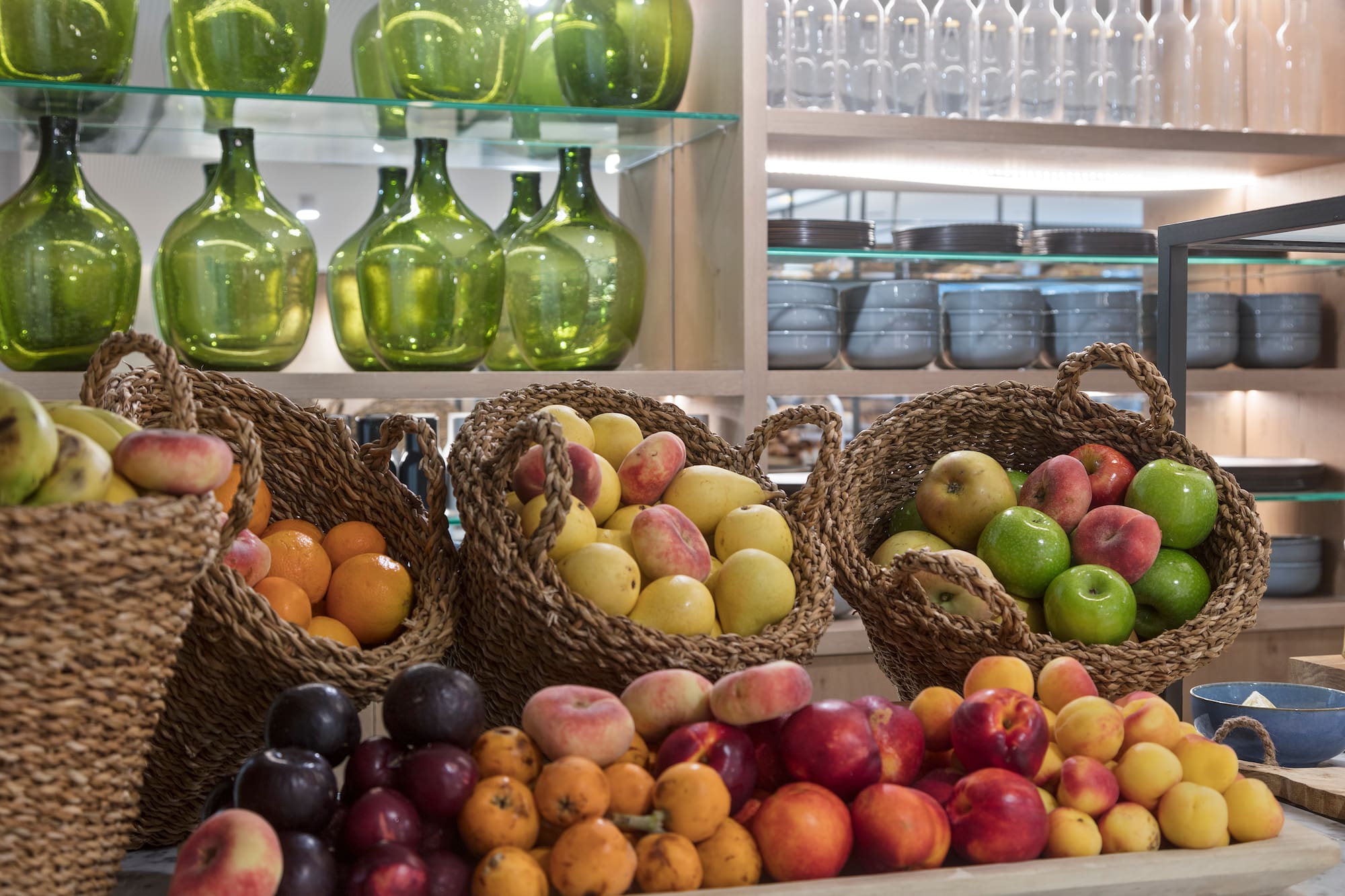 baskets of fruit on a shelf