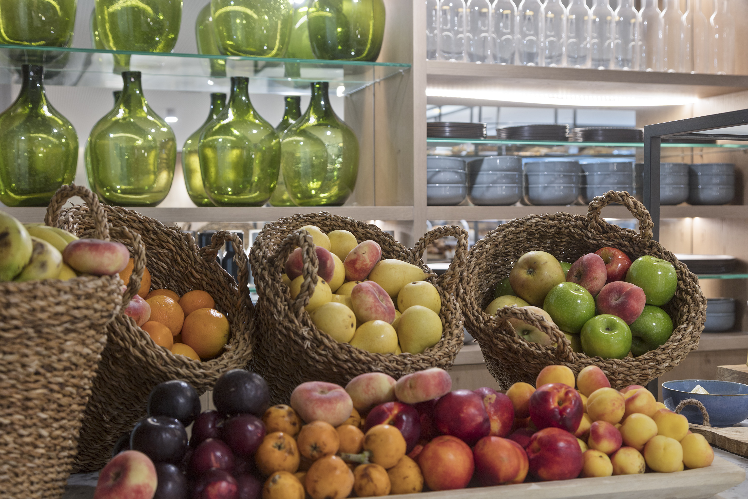 baskets of fruit on a shelf