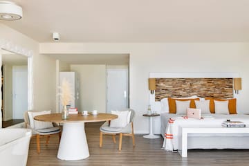 a room with a bed and a table