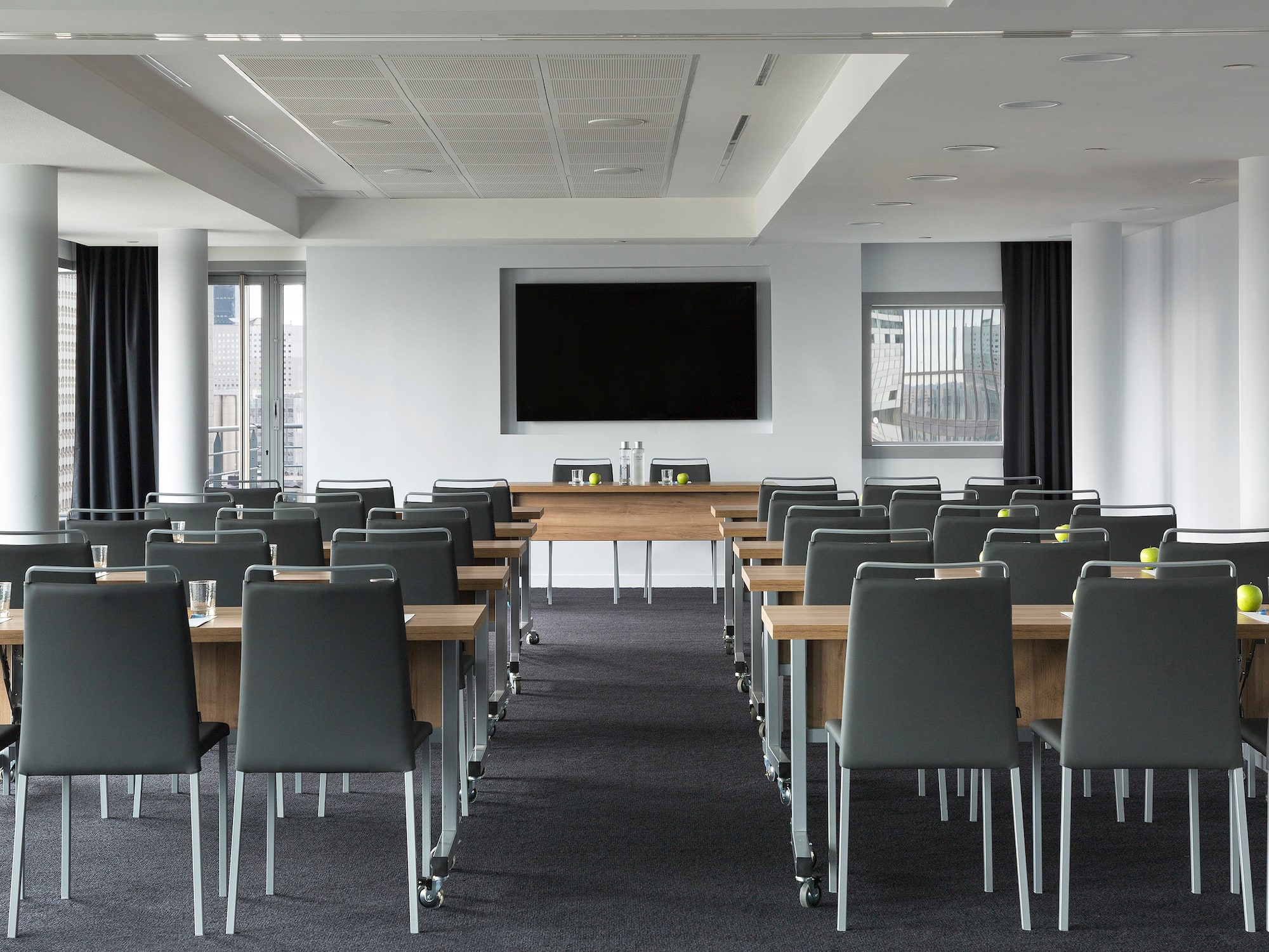a room with tables and chairs