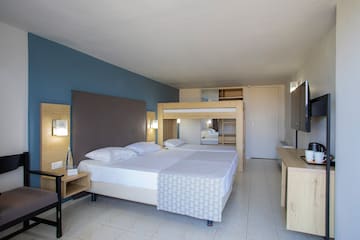 a room with a bed and a mirror