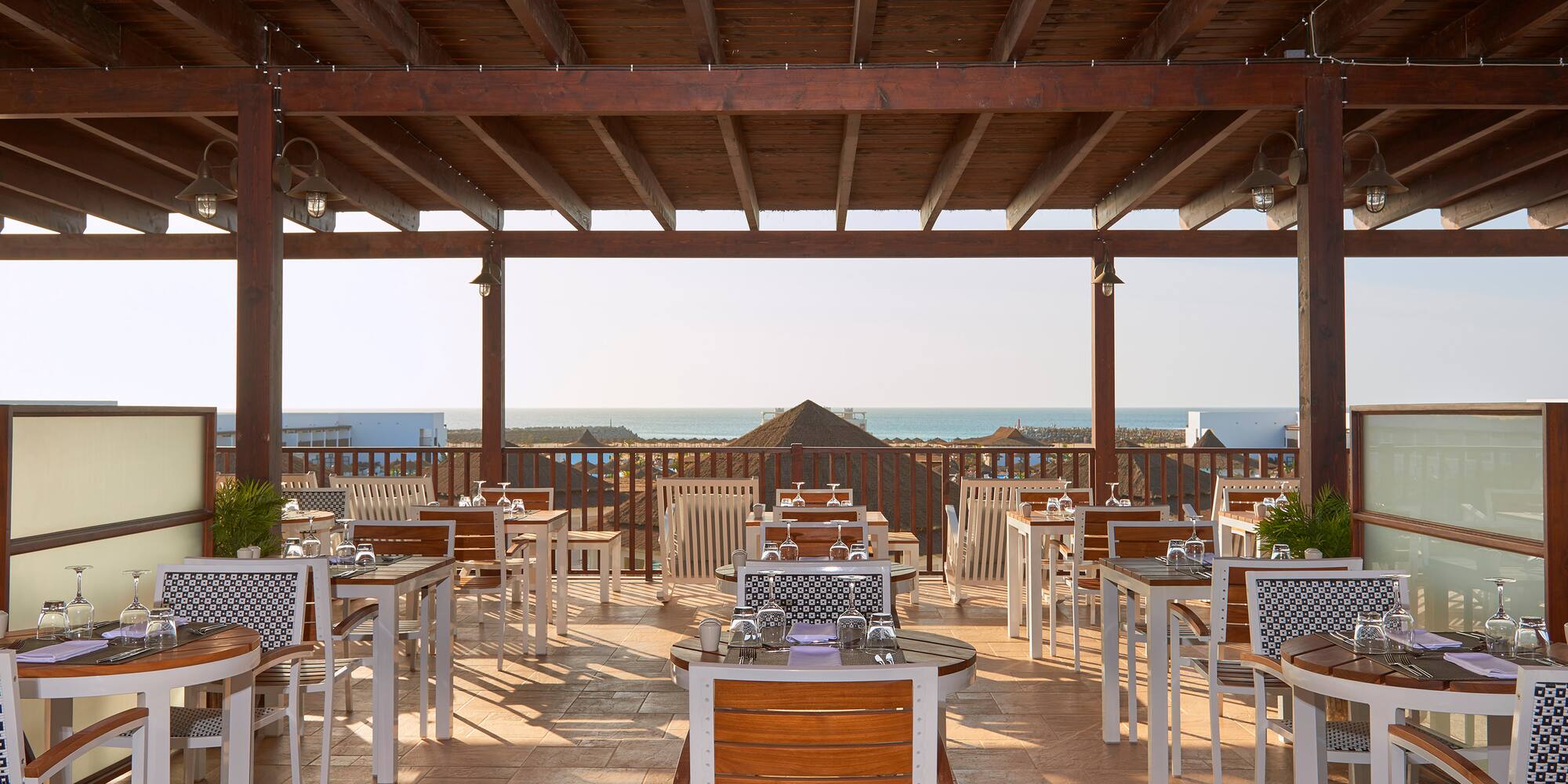 a restaurant with tables and chairs