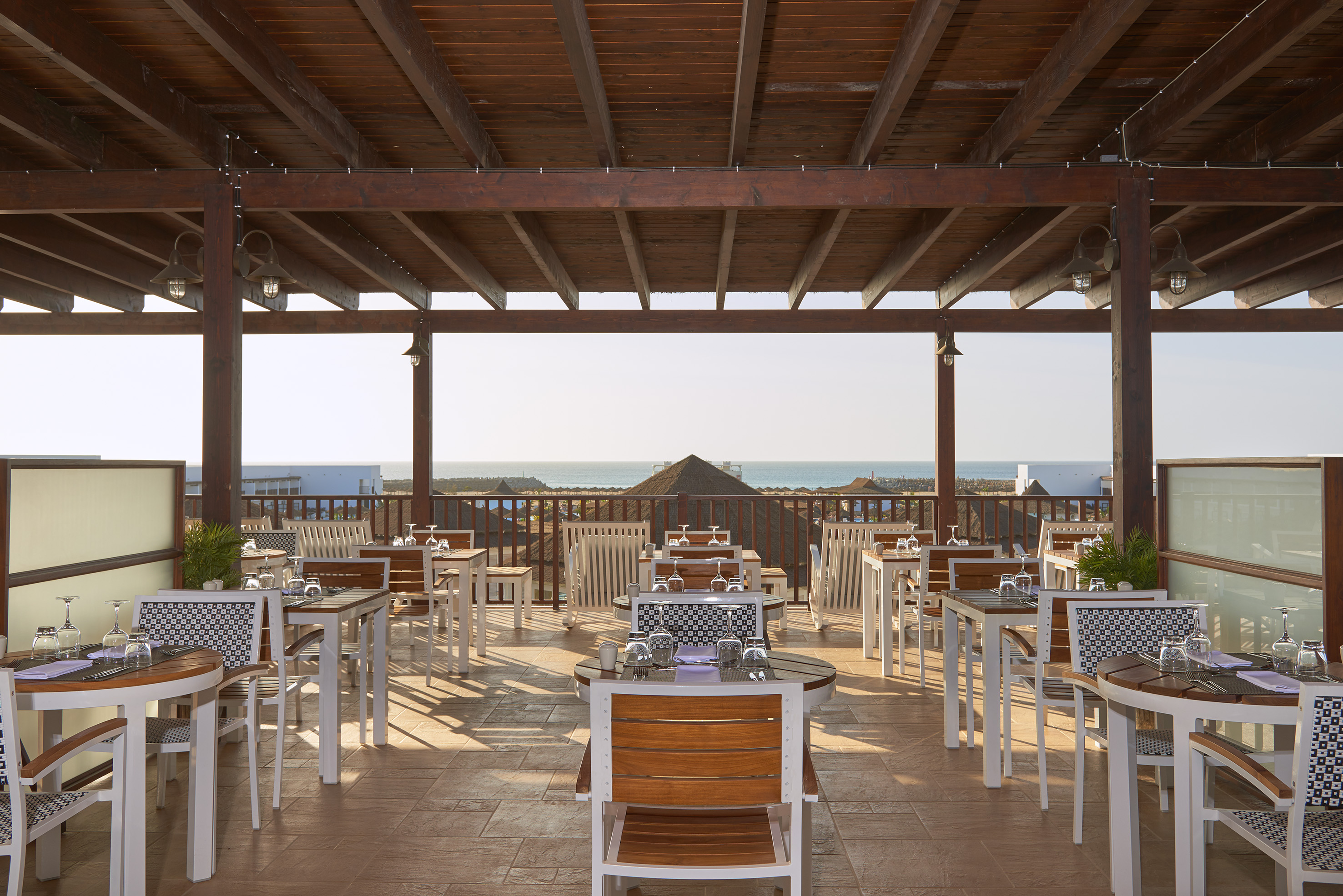 a restaurant with tables and chairs