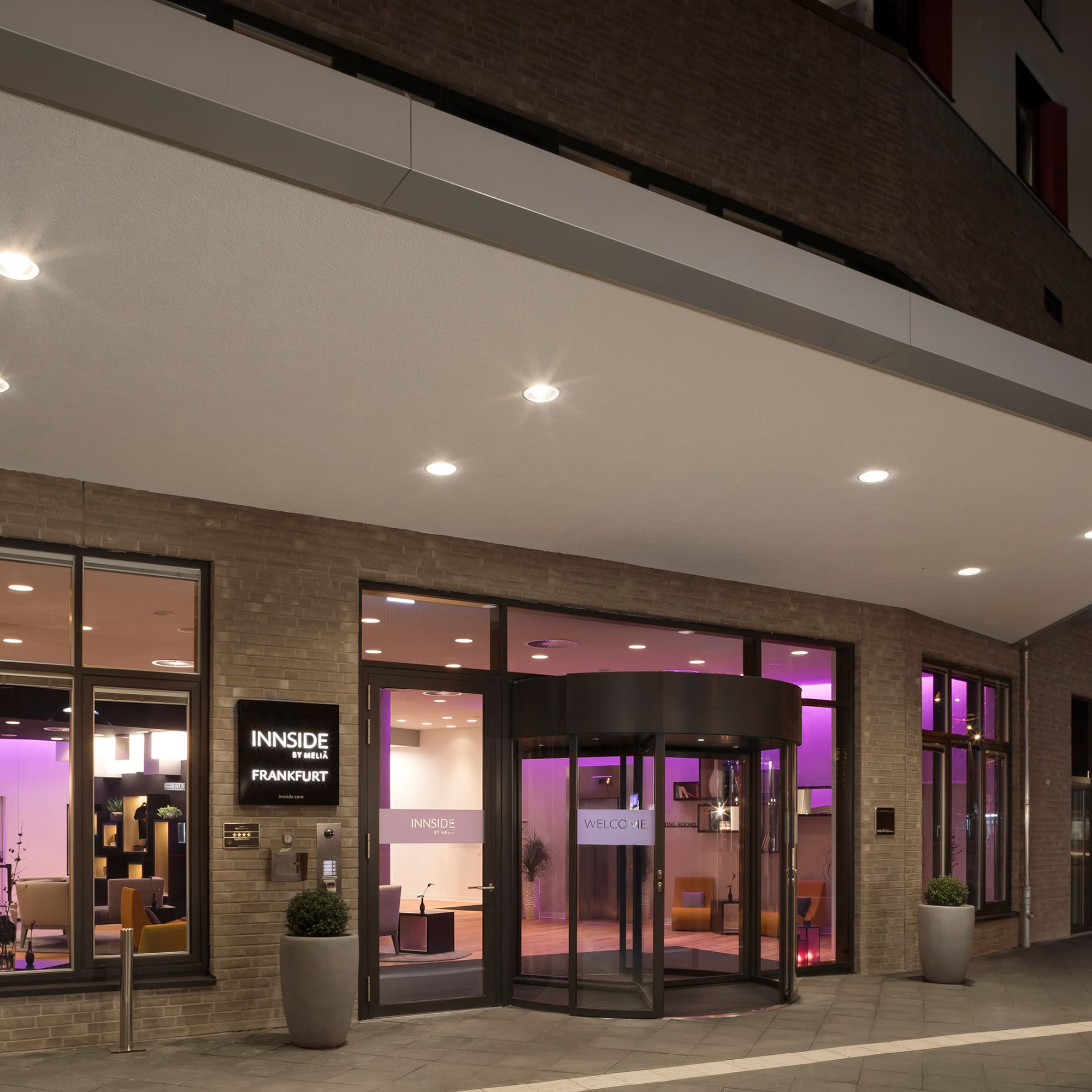 a building with purple lights