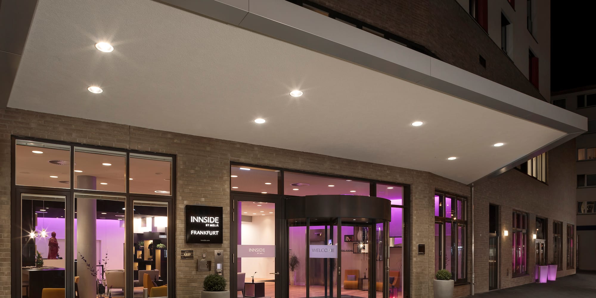 a building with purple lights