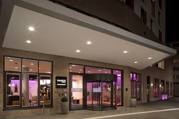 a building with purple lights
