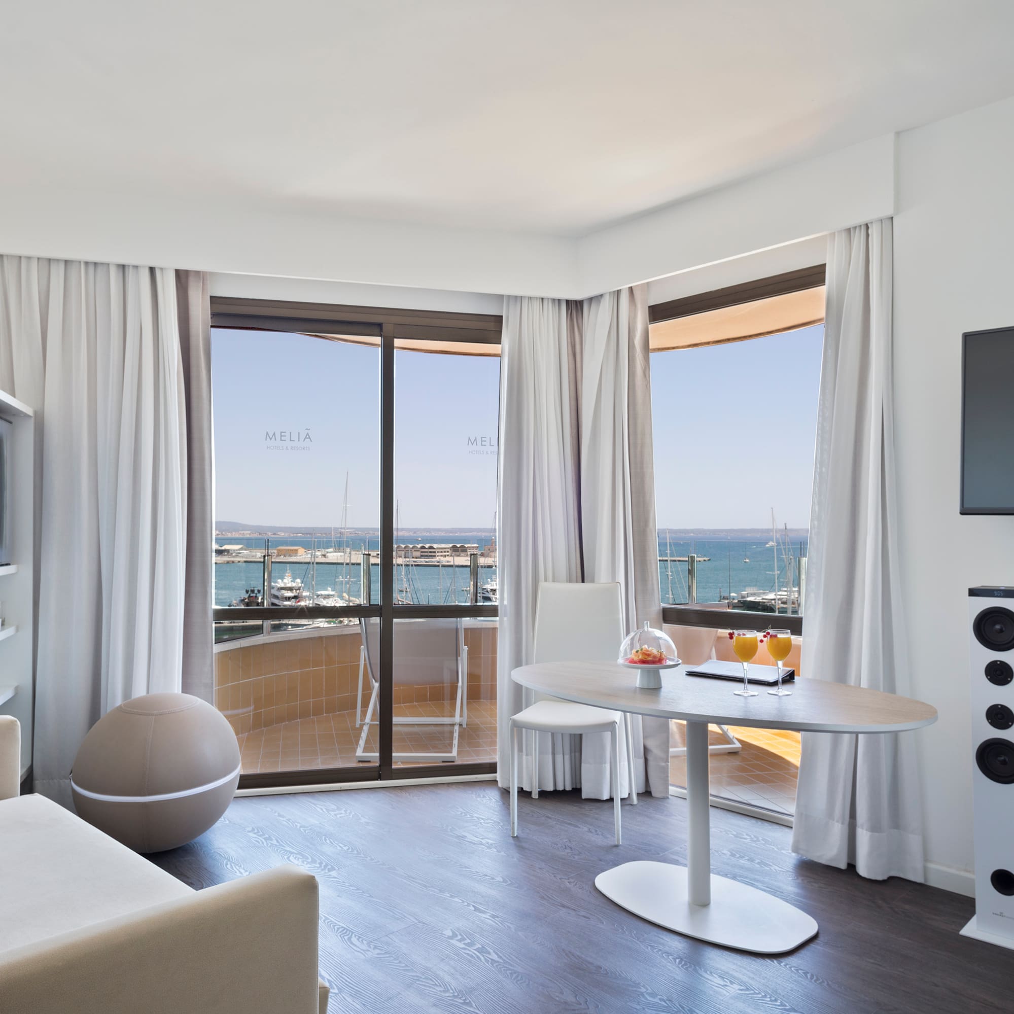 a room with a table and a television