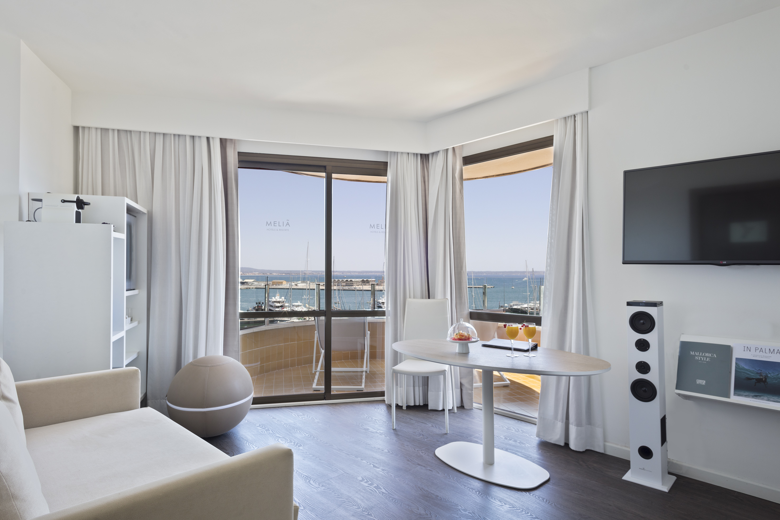 Meliá suite, marina view balcony, modern decor, Mallorca.
