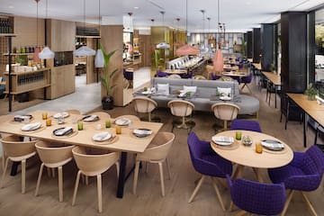 a restaurant with tables and chairs