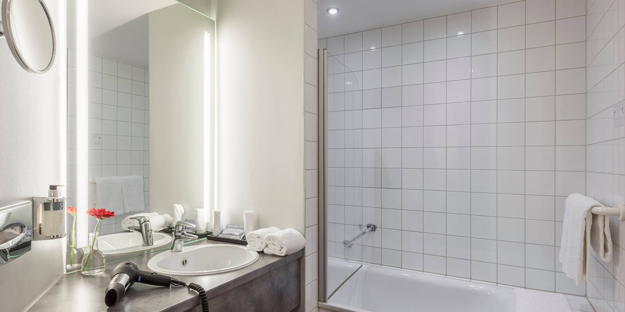 a bathroom with a sink and bathtub