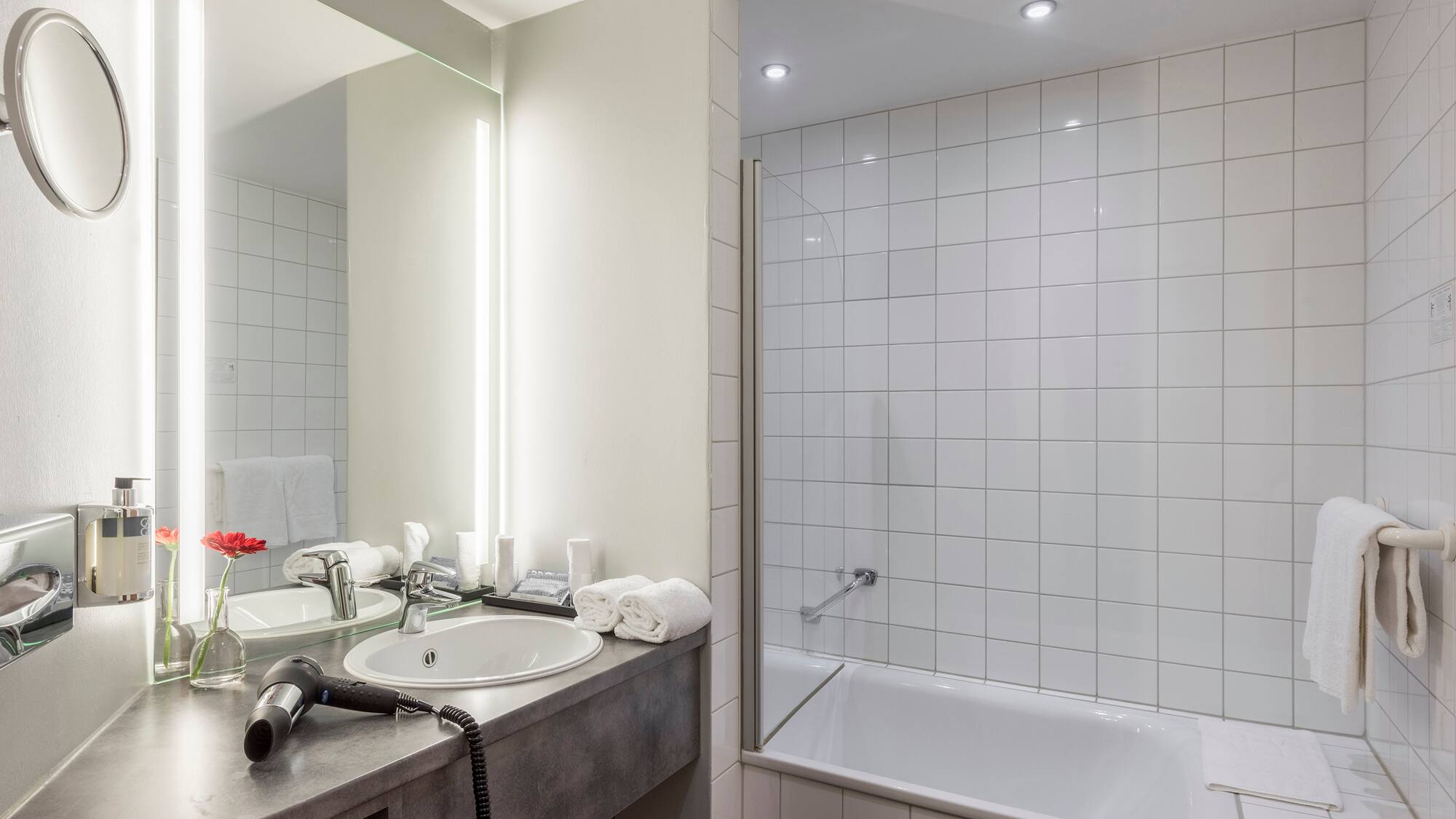 a bathroom with a sink and bathtub