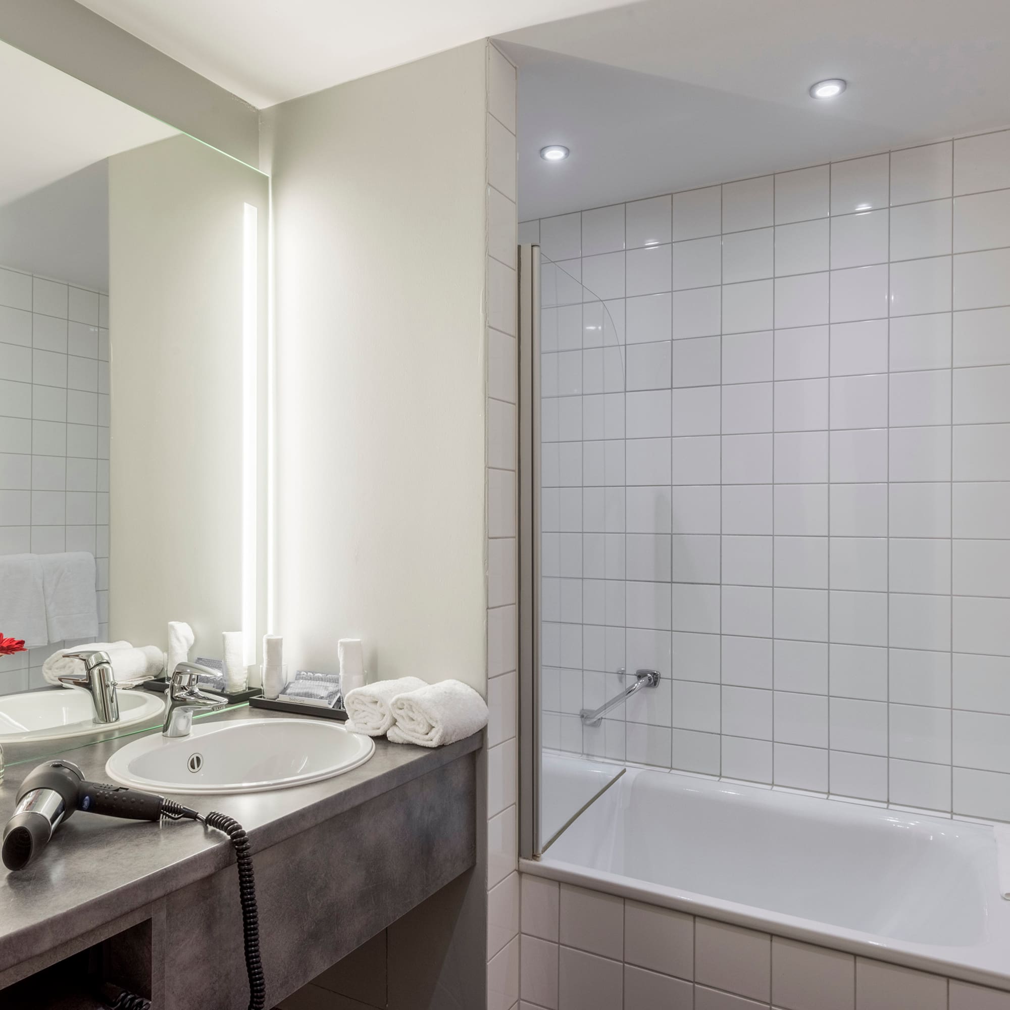 a bathroom with a sink and bathtub